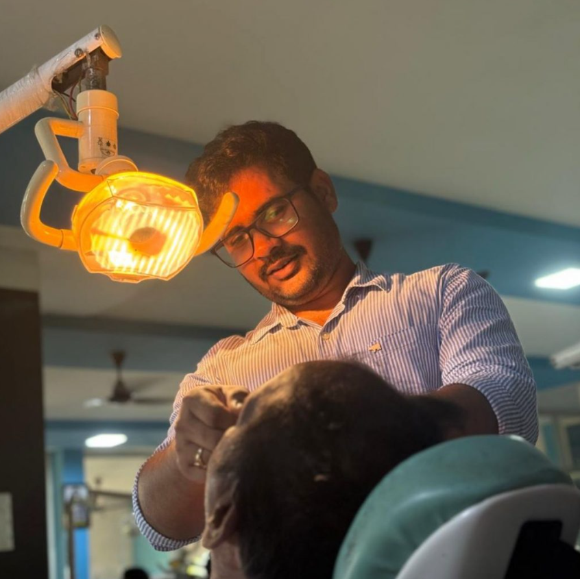 Expert Dentist Treating Patient